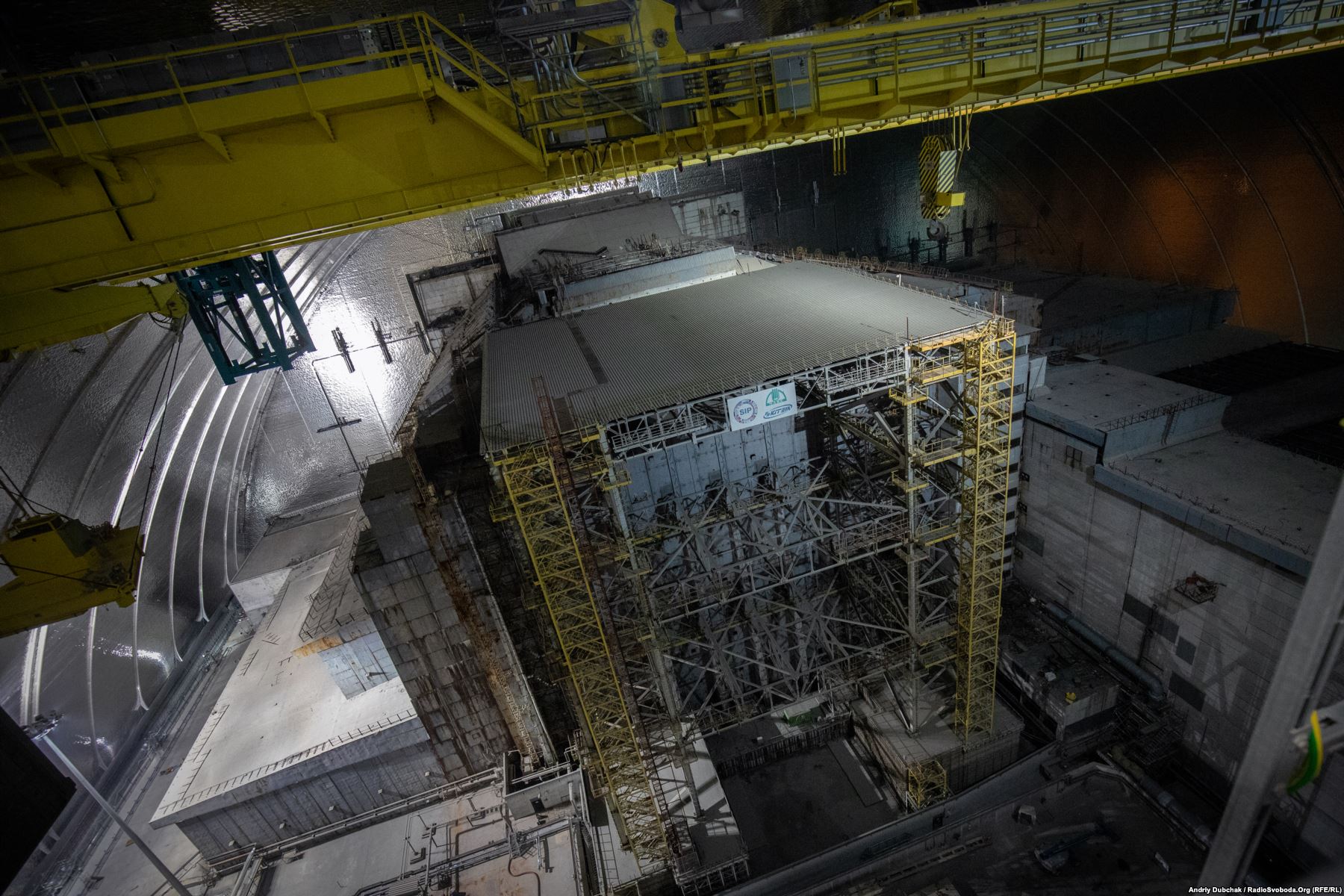 A new steel structure was built under the containment shield to support the decaying concrete sarcophagus in Chernobyl's reactor number four. Eventually, officials plan to dismantle the sarcophagus and remove the remaining nuclear fuel from the plant. Photo by: Andriy Dubchak