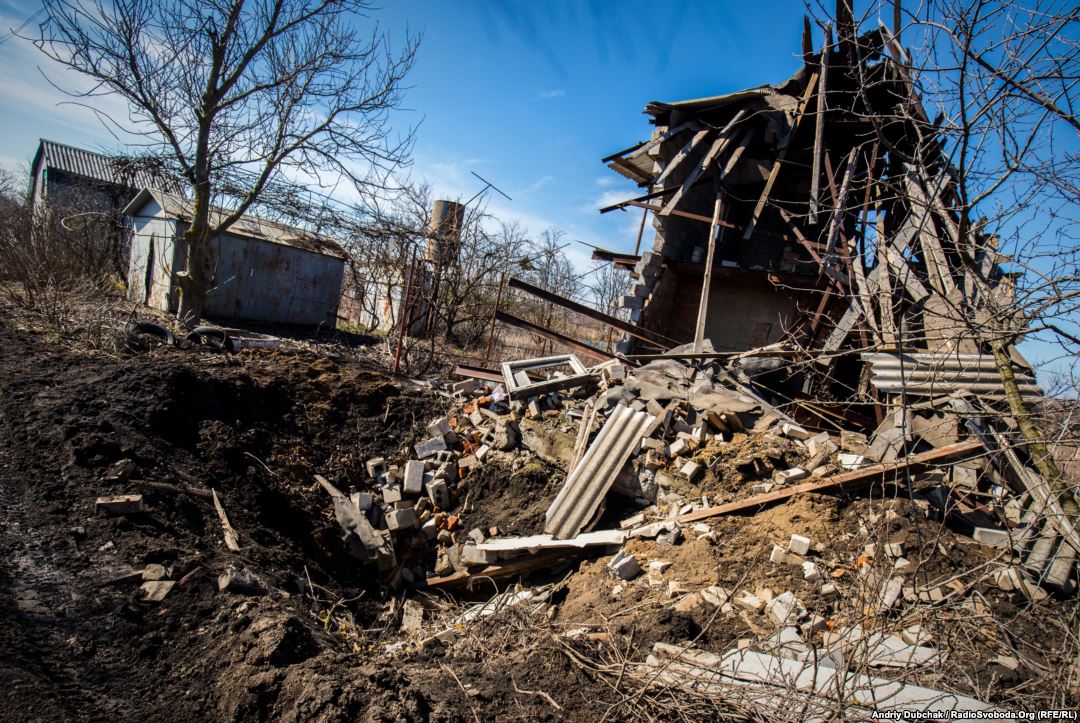 The remains of a dacha destroyed by a direct hit from a 152-mm artillery shell. Photo by: Andriy Dubchak
