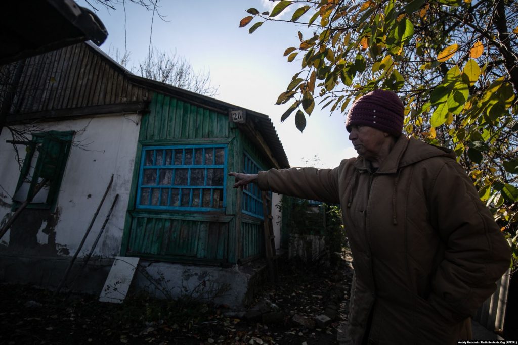 71-year-old Liubov Semenivna shows us the bullet holes fired on the walls of her house a few days ago (October 28). The 7.62 caliber bullets hit the walls and the roof (Ukraine reporter Andriy Dubchak)